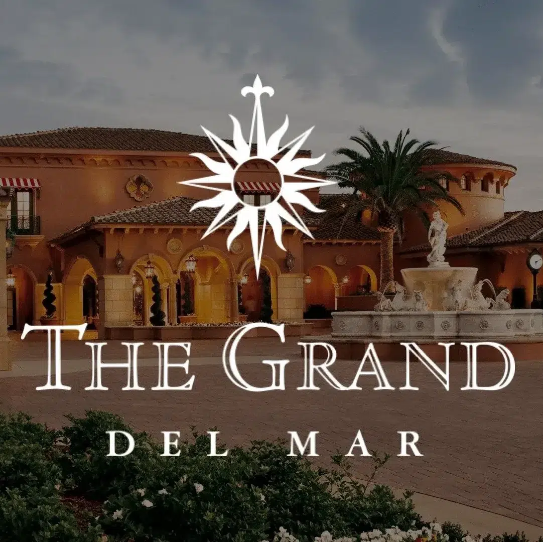 The entrance of The Grand Del Mar featuring a fountain and architectural details.